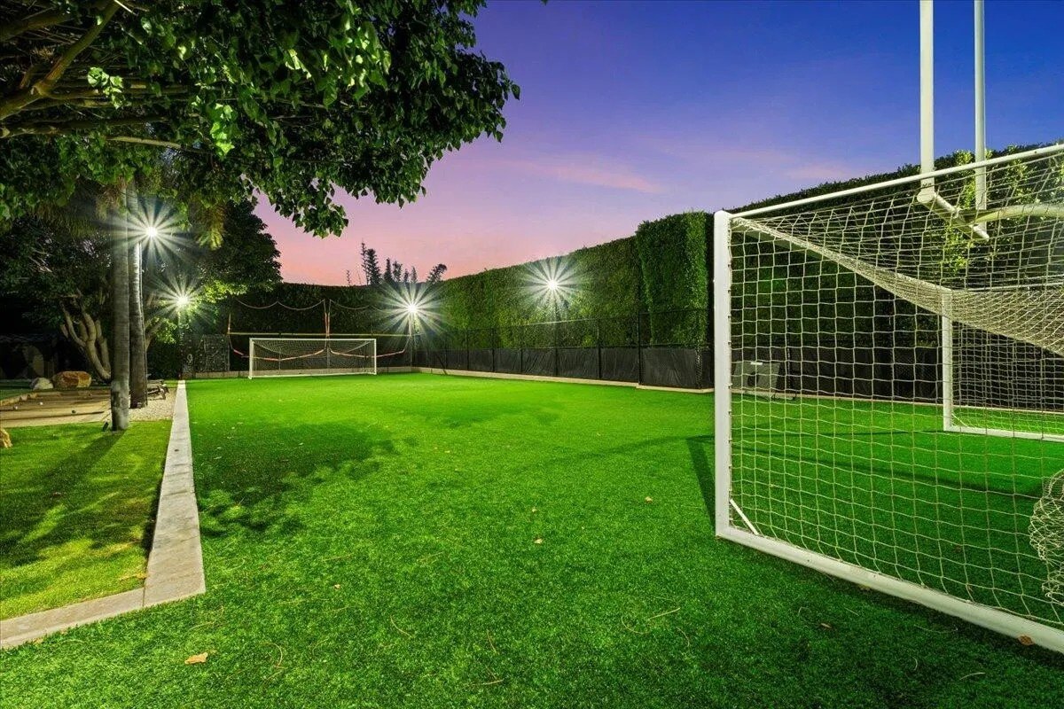 A fully lighted field provides for practice and play both night and day.