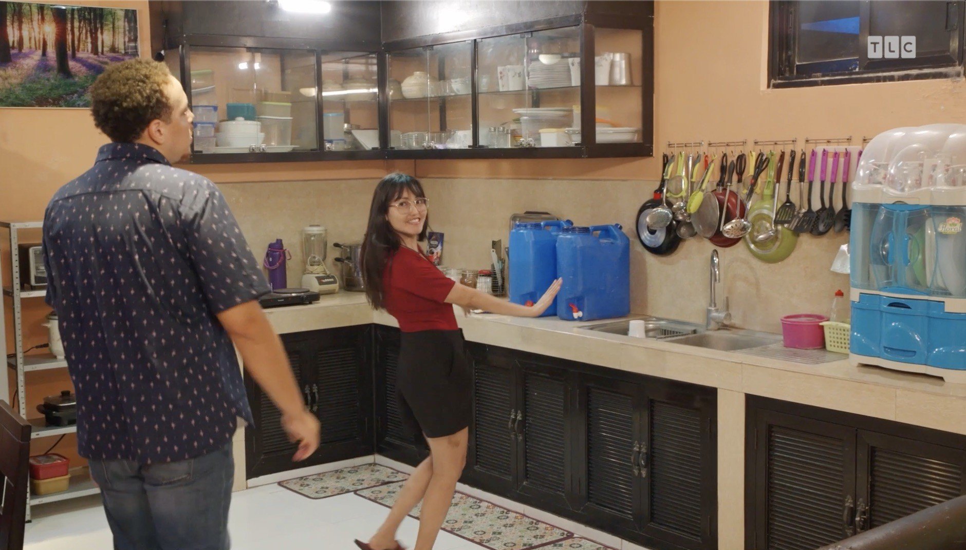 Despite the kitchen appearing spacious enough for cooking, dining, and gathering, Annalyn describes it as modest.