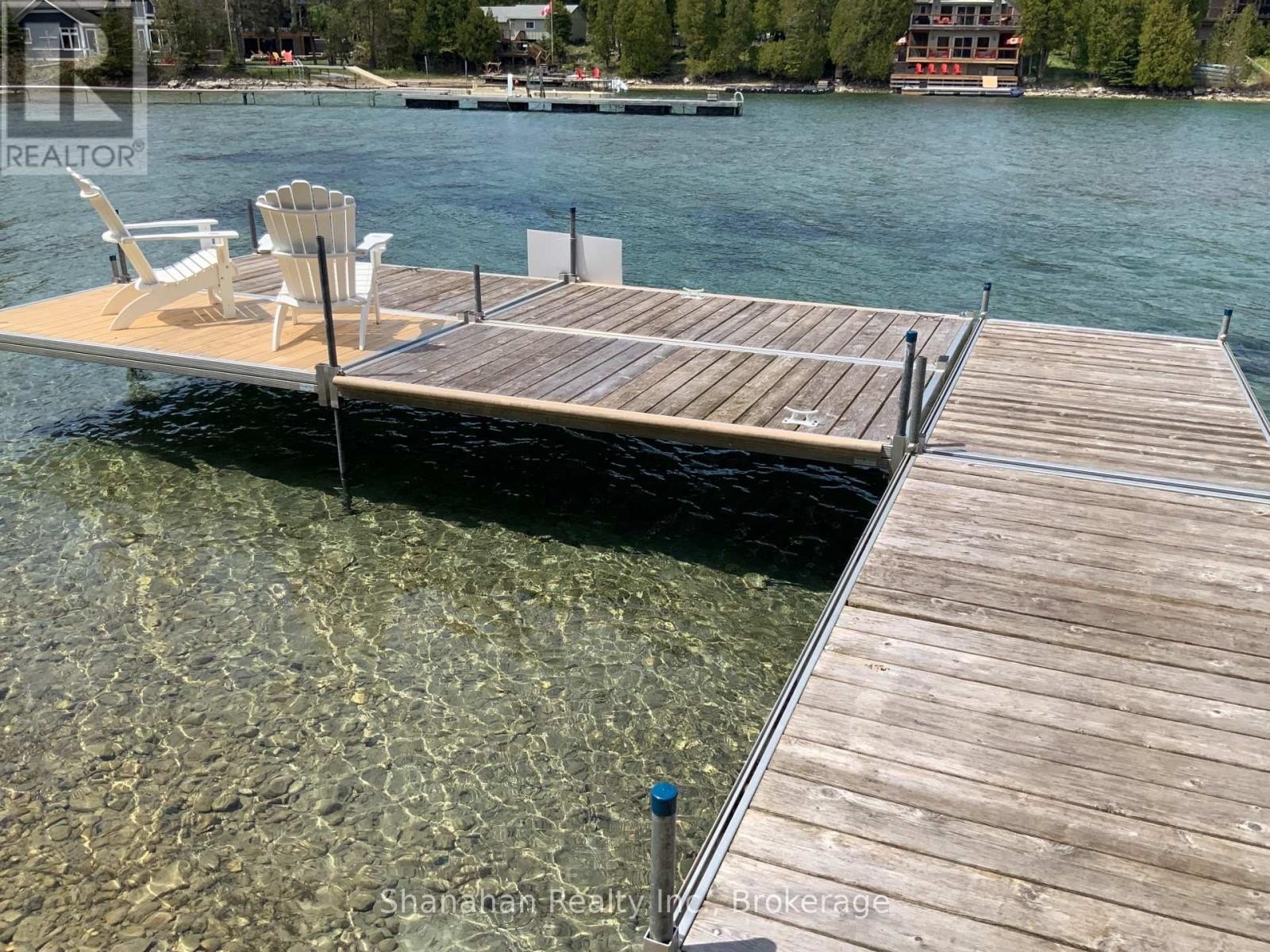 $1.3 Million Lake House With Views of a Shipwreck Offers a Pirate’s Paradise