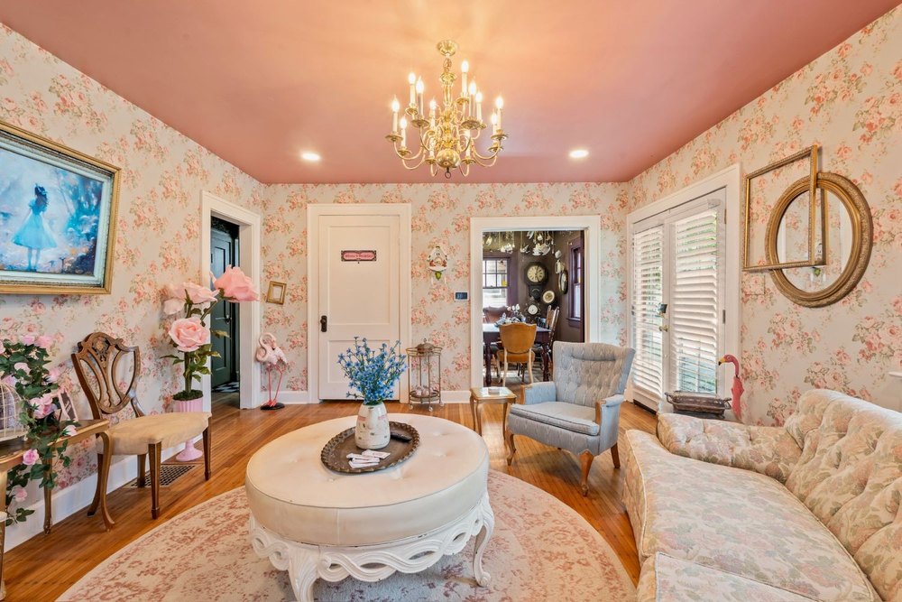 Living room of Alice in Wonderland bungalow in Indianapolis, IN, on sale for $215,000