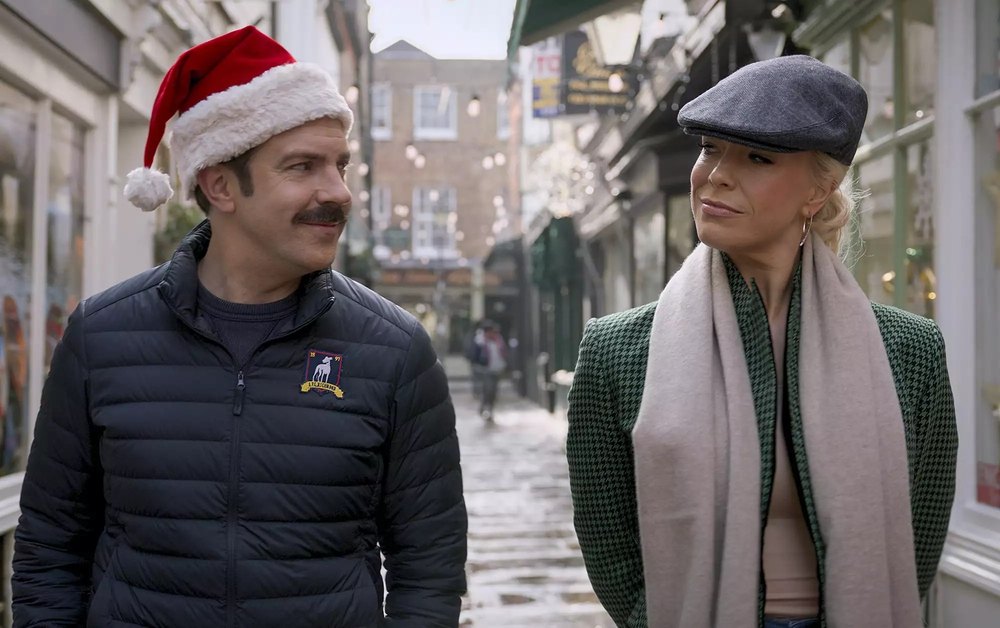 A scene from Ted Lasso with Jason Sudeikis and Hannah Waddingham as their characters Ted Lasso and Rebecca Welton