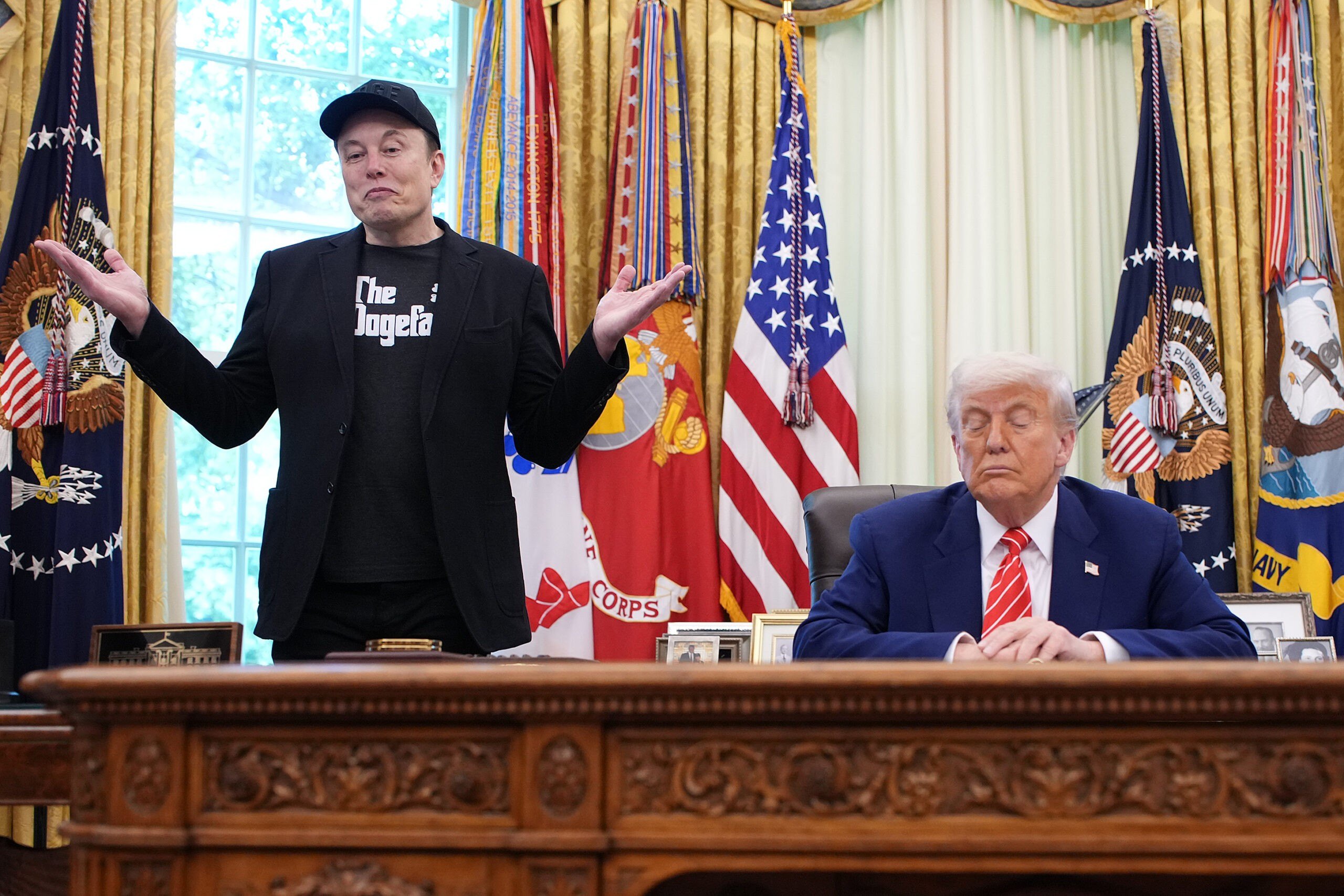 Donald Trump and Elon Musk in the Oval Office.