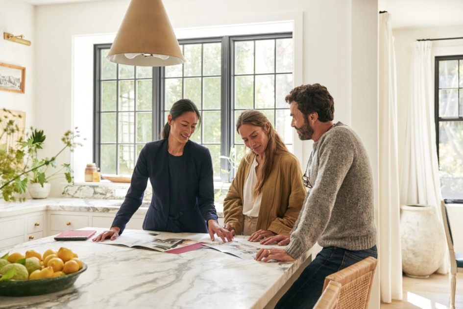 Agent discussing options with their client in the kitchen