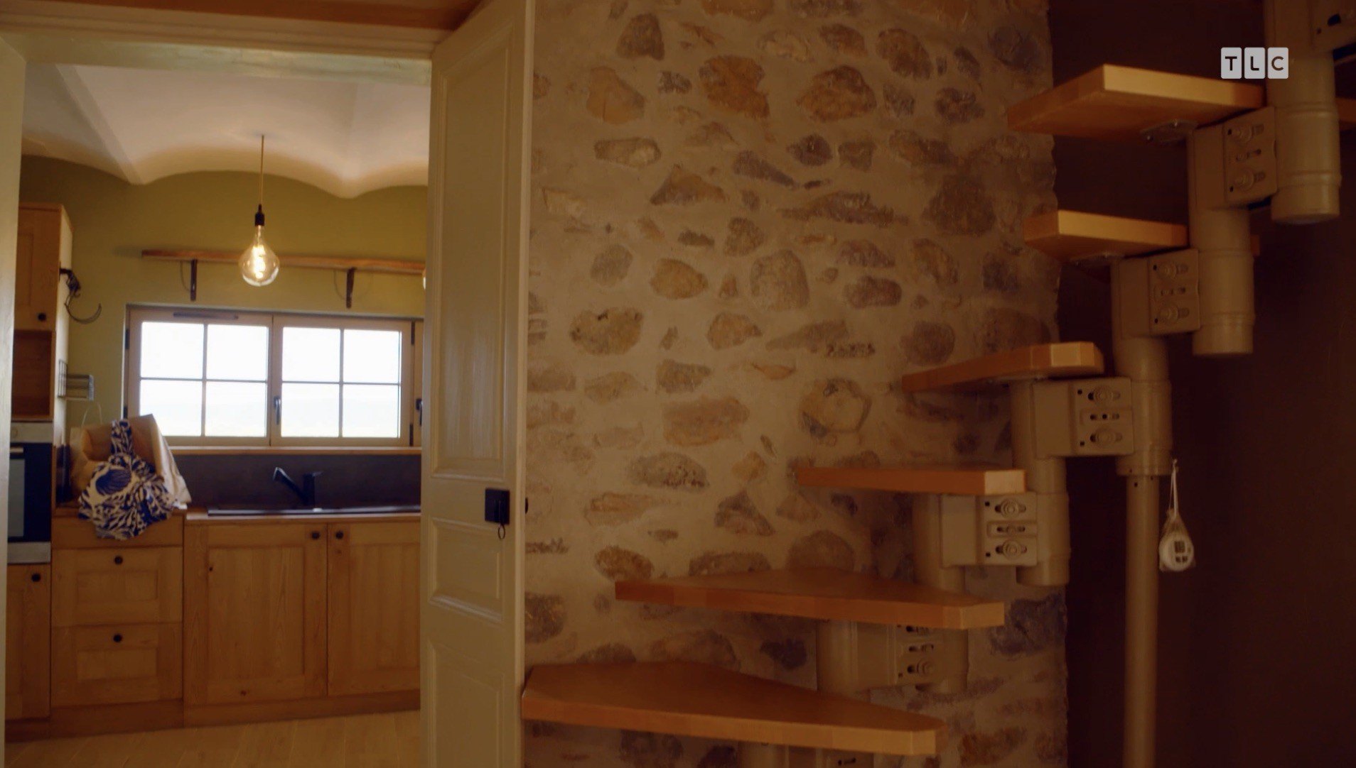 Beautiful stonework is present on exterior and interior walls.