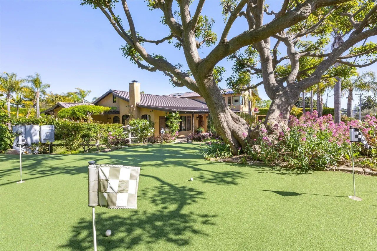 The shaded putting green provides short game practice.
