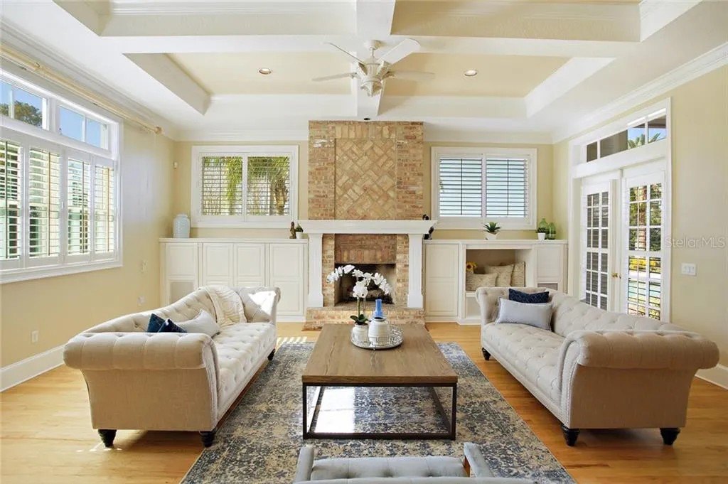 Inside the $1.2 Million Florida Home Za'Darius Smith Will Retreat To As He Announces Shock Retirement From Philadelphia Eagles Living space with a fireplace in Za'Darius Smith's home in Florida