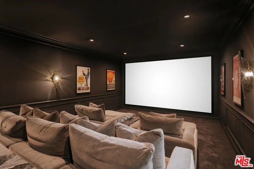 A movie theater with black walls in a home in Hidden Hills California belonging to Kylie Jenner