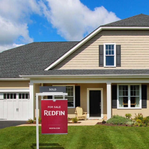 Home for sale with a Redfin sale sign outside