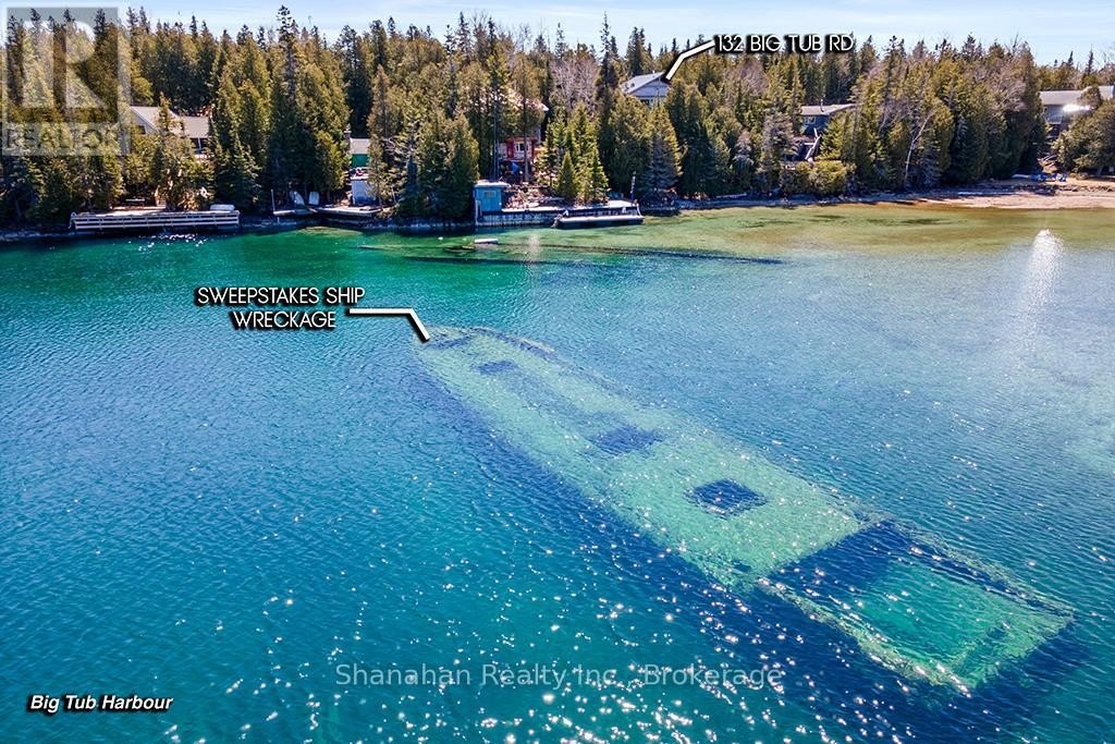 $1.3 Million Lake House With Views of a Shipwreck Offers a Pirate’s Paradise