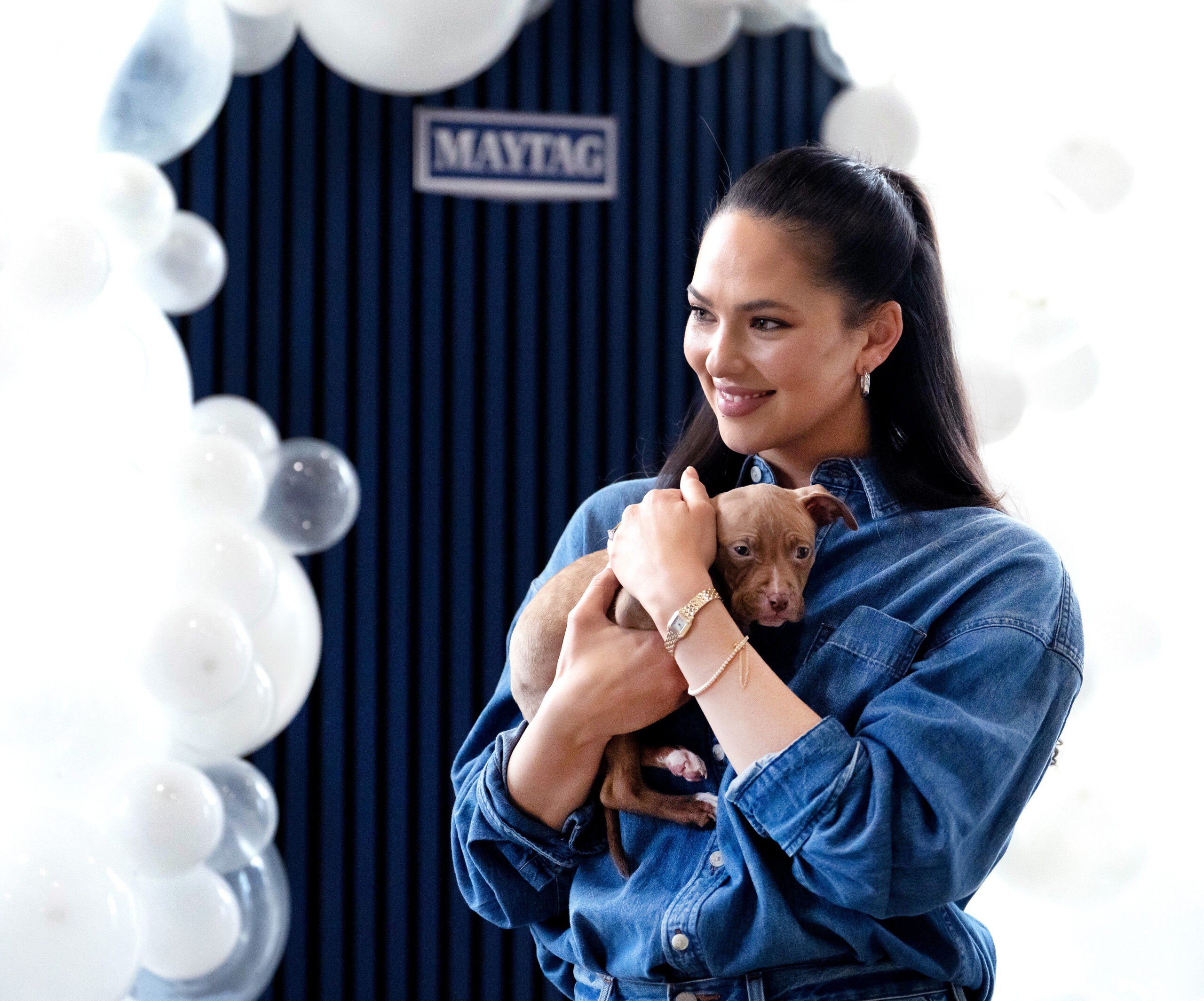 As part of her Maytag campaign, Christen attended a pet adoption event, though she says she's not quite ready to introduce "more chaos" at home just yet.