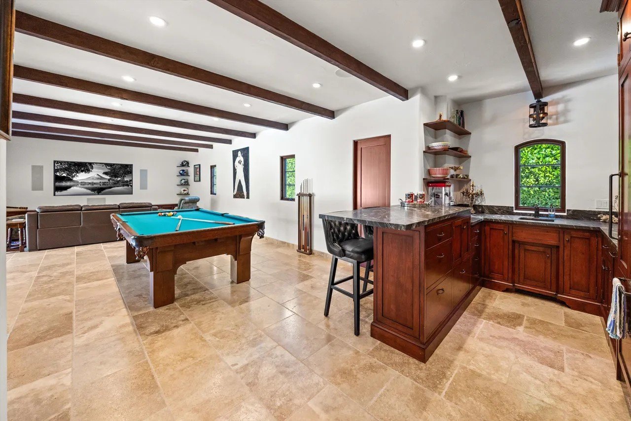 The Luckhursts added a lower level with a game/media room and bar.