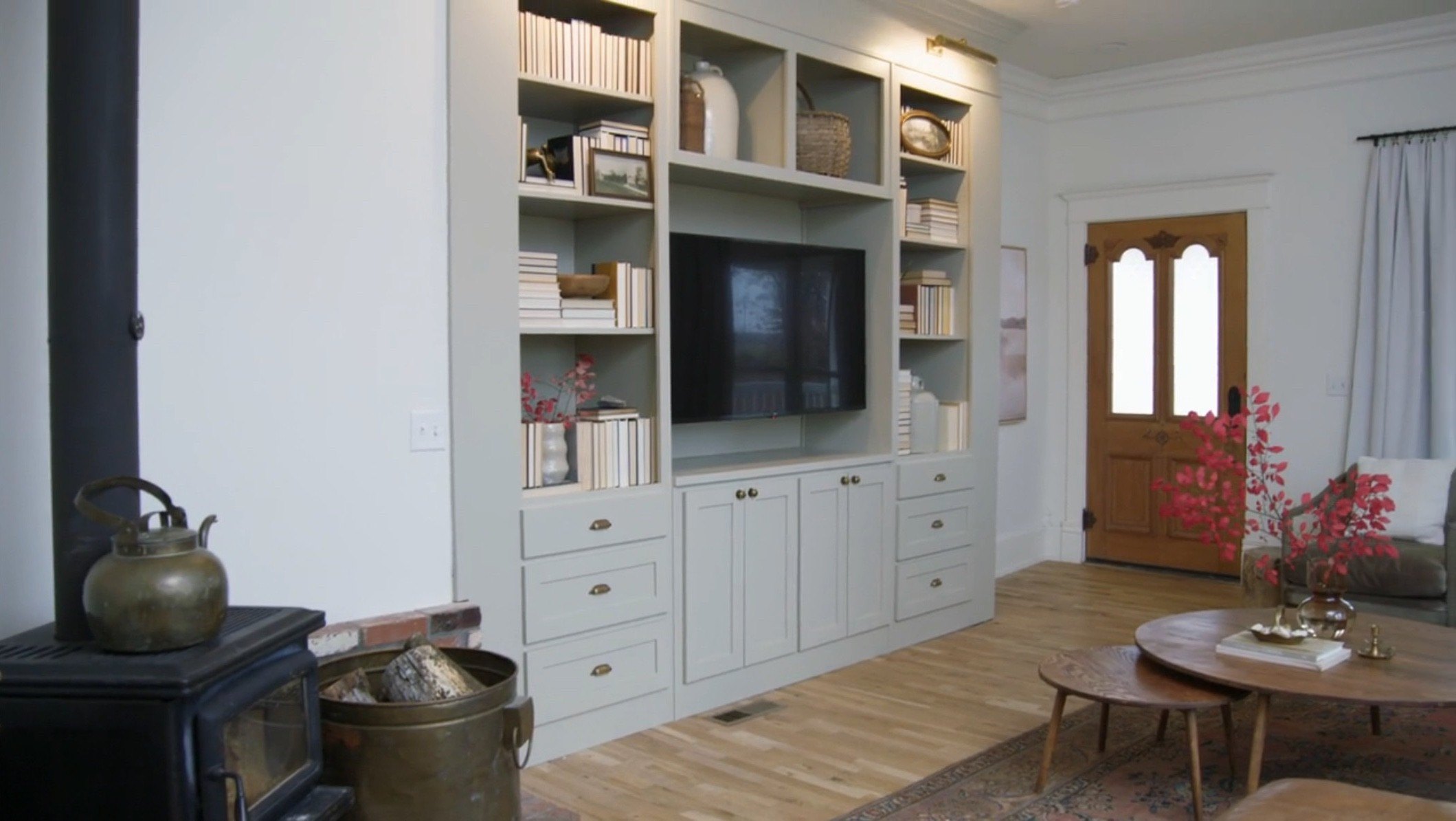 Every room of the family farmhouse "tells a story," including the living room where the children's heights are notched in the door.