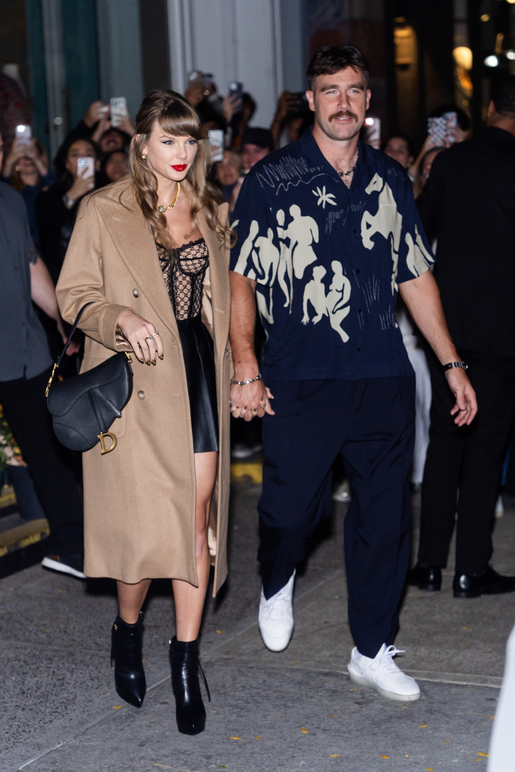 NEW YORK, NEW YORK - OCTOBER 11: Taylor Swift (L) and Travis Kelce are seen in SoHo on October 11, 2024 in New York City. (Photo by TheStewartofNY/GC Images)