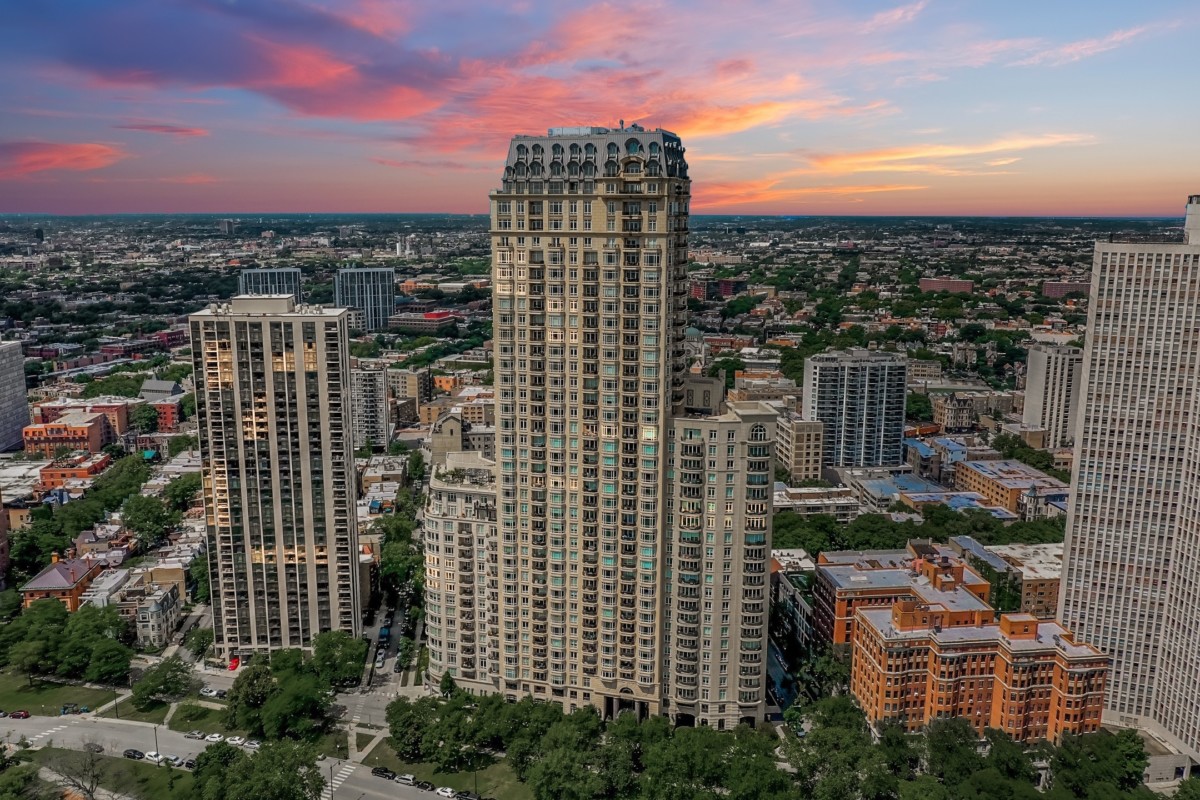 high rise apartment complex in the middle of a city