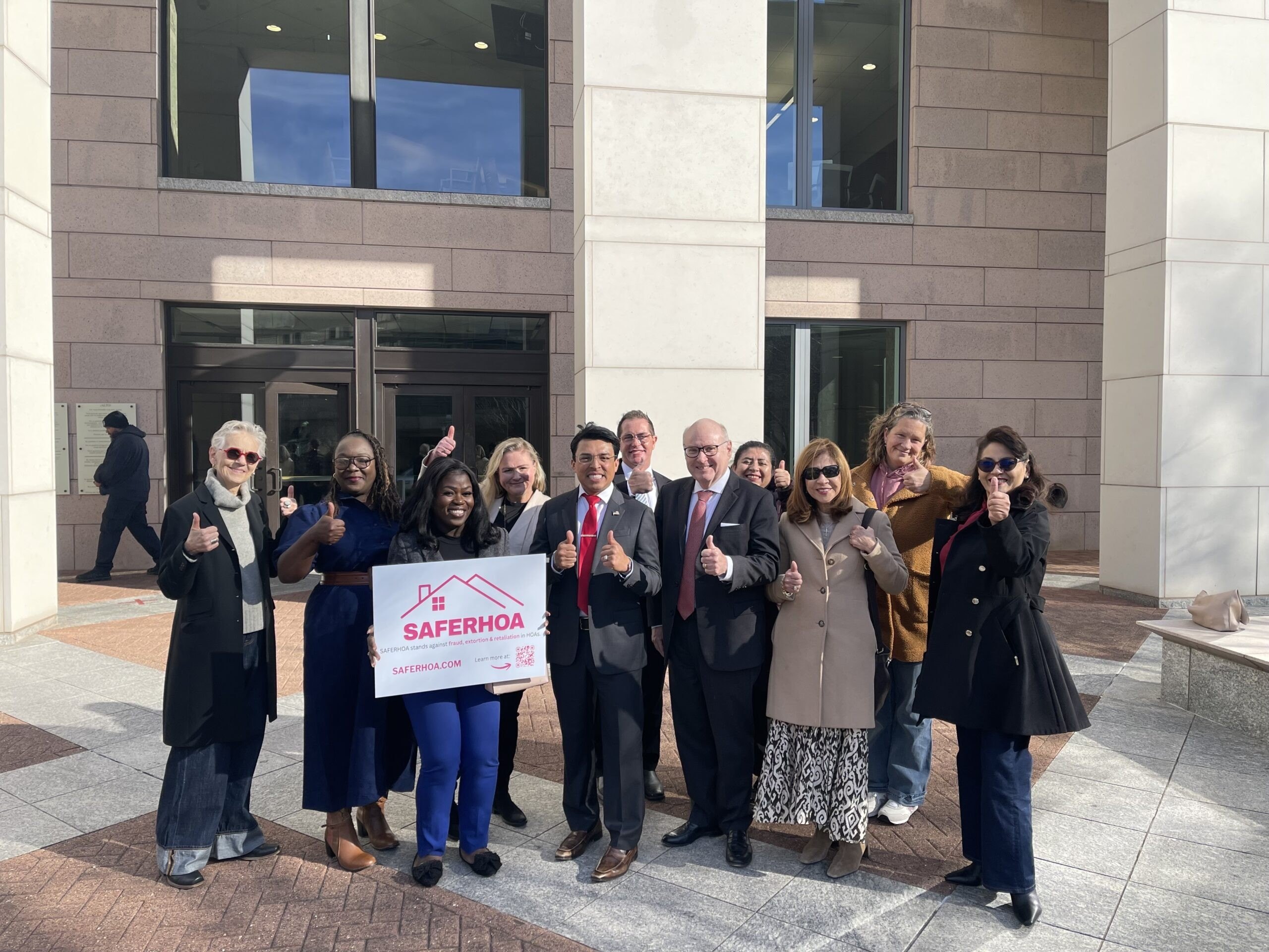 Photo of Jeffrey Baldwin with his supporters outside the courtroom.