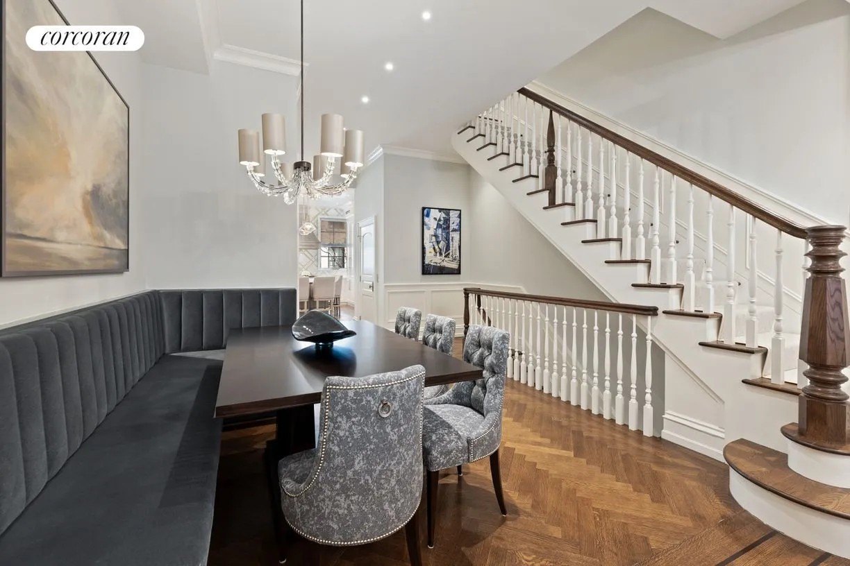 A dining space in the ‘Breakfast at Tiffany’s’ Townhome after a gut renovation