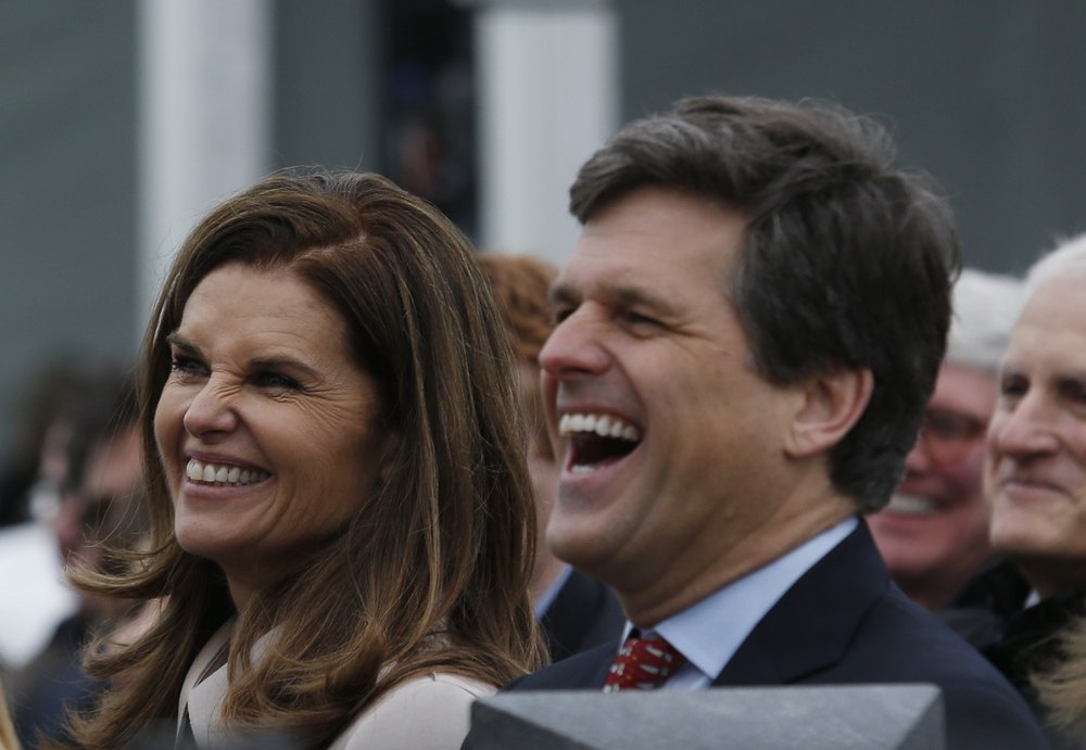 Maria Shriver, left, and her brother Tim, react during a formal ceremony to dedicate the Edward M. Kennedy Institute for the United States Senate in Boston on March 30, 2015