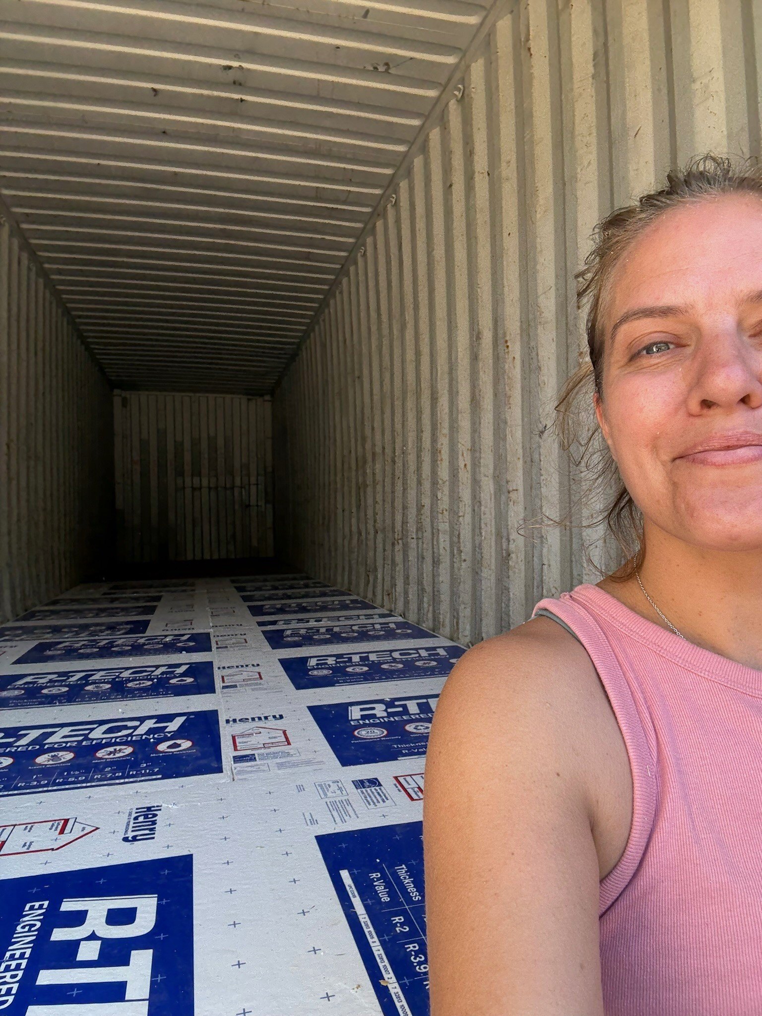 A Georgia woman shows off the flooring in her shipping container home.