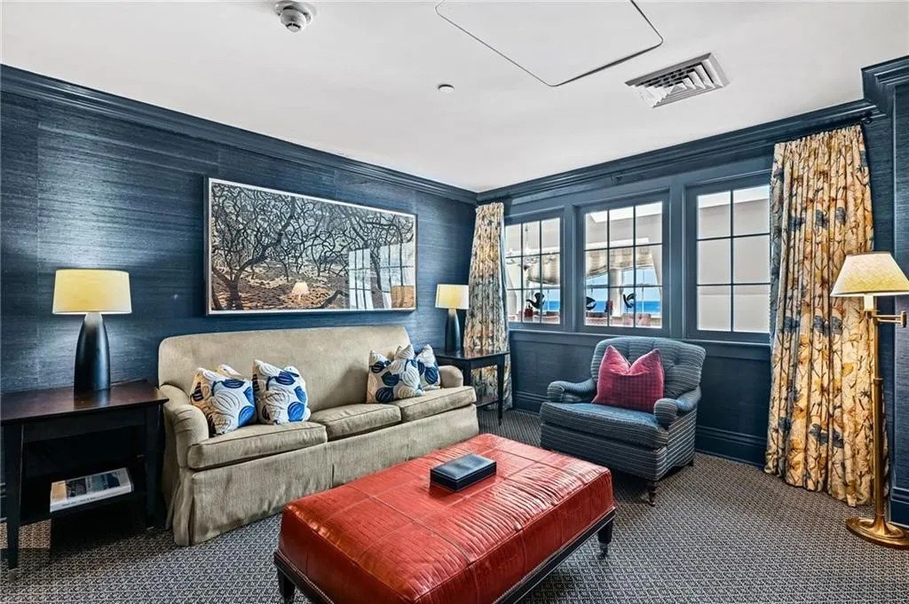 A room with blue walls in the Penthouse on top of the Ocean House in Rhode Island where Taylor Swift and Travis Kelce may be getting married
