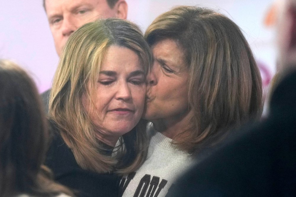 Savannah Guthrie, left, gets a kiss form Hoda Kotb during a visit to the Today show