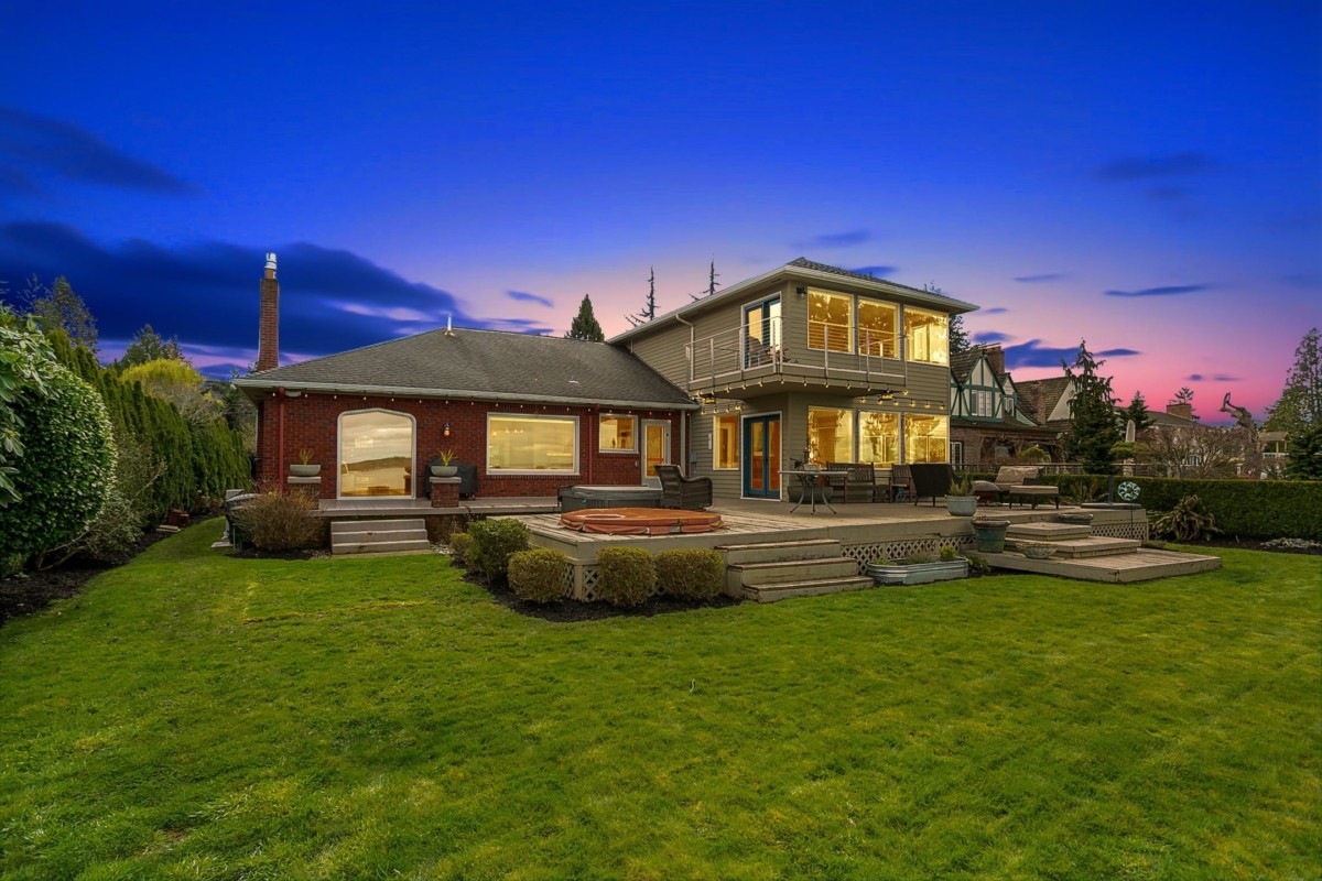 backyard view of a home at nighttime