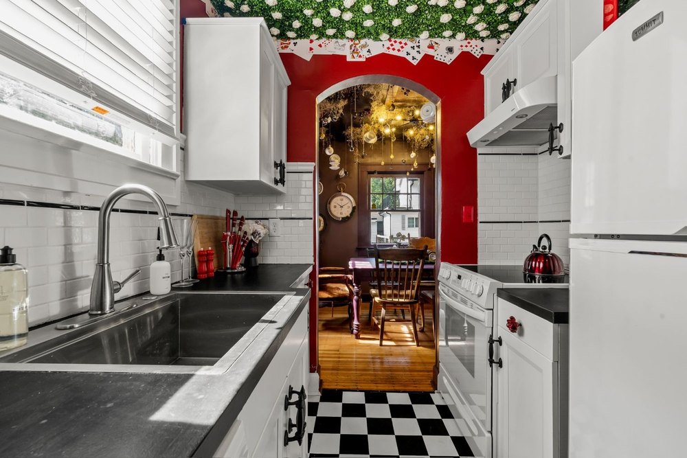 Kitchen of Alice in Wonderland bungalow in Indianapolis, IN, on sale for $215,000