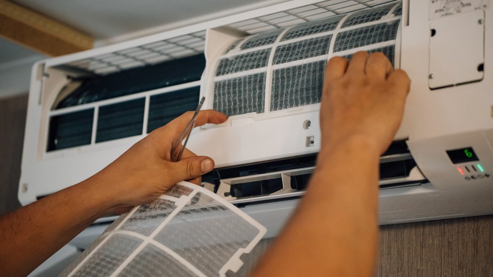 Changing the filter on your in-unit AC.