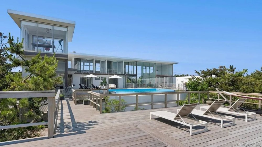 Pool area of Crest House in Cherry Grove, NY, on sale for $3,995,000