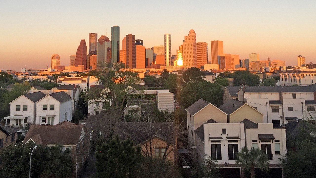 Houston downtown urban skyline at sunset townhouse