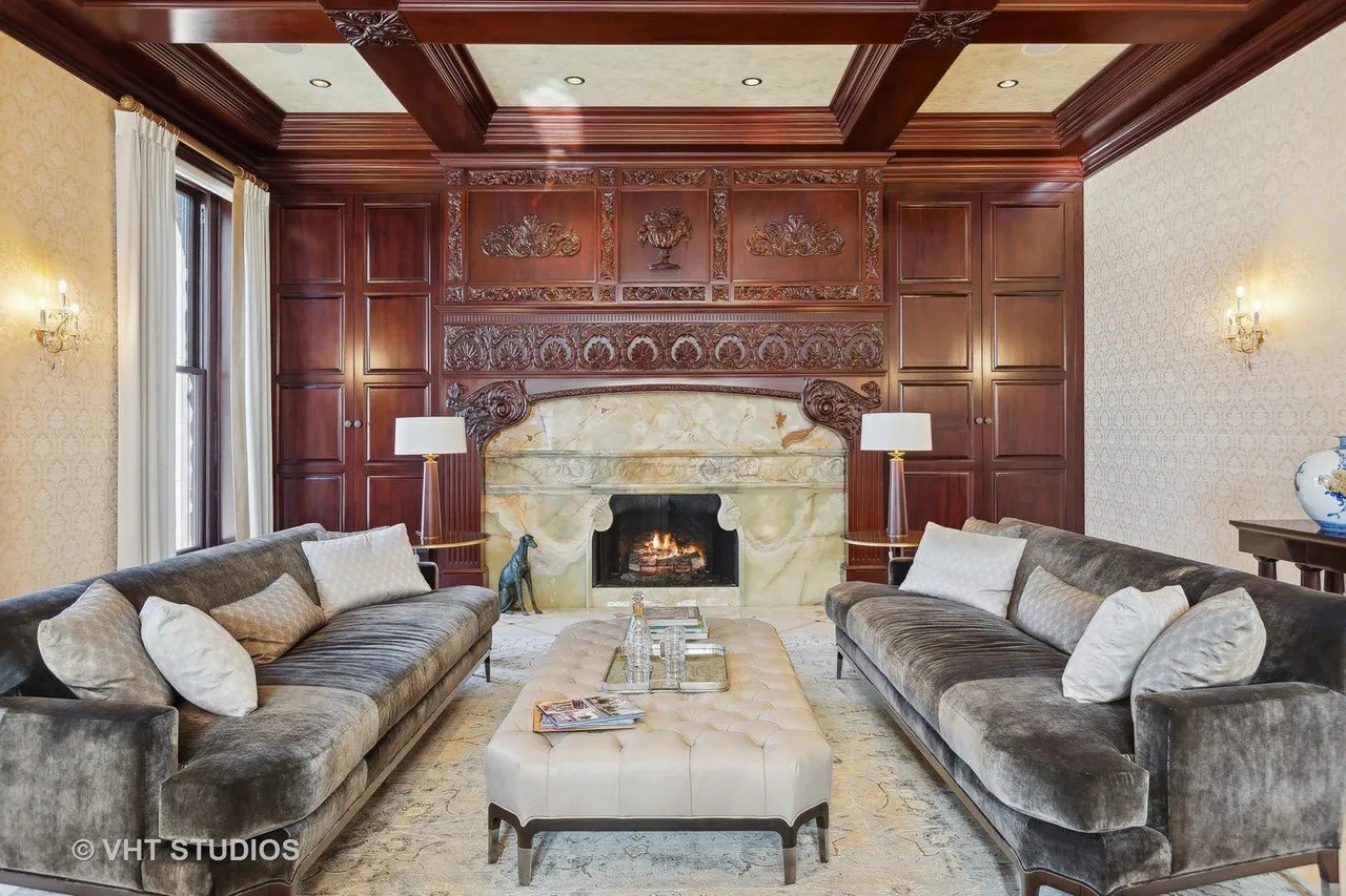 Ornate mahogany paneling and lavish marble fireplaces are among its classic Gilded Age features.