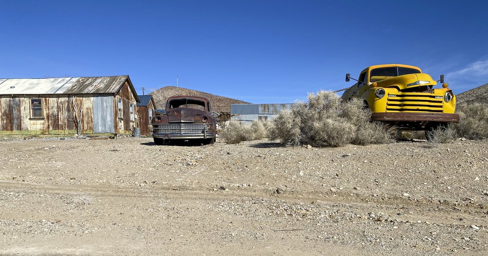 Old vehicles in a former mining town near Death Valley.