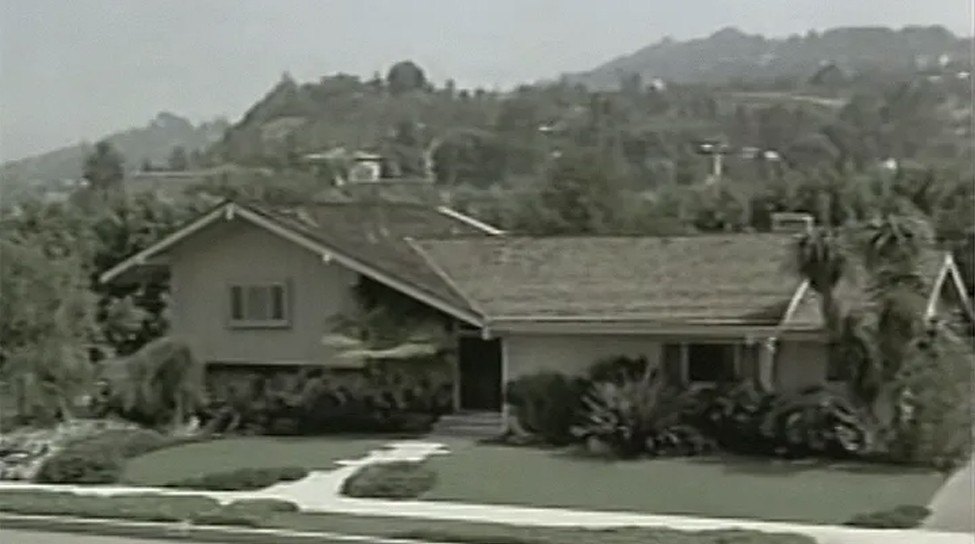 A still of The Brady Bunch house from the show