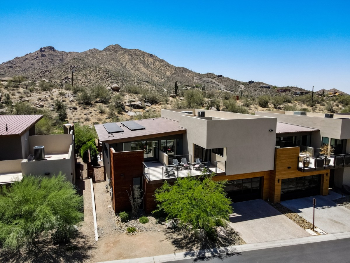 sustainable architecture home with solar panels on the roof