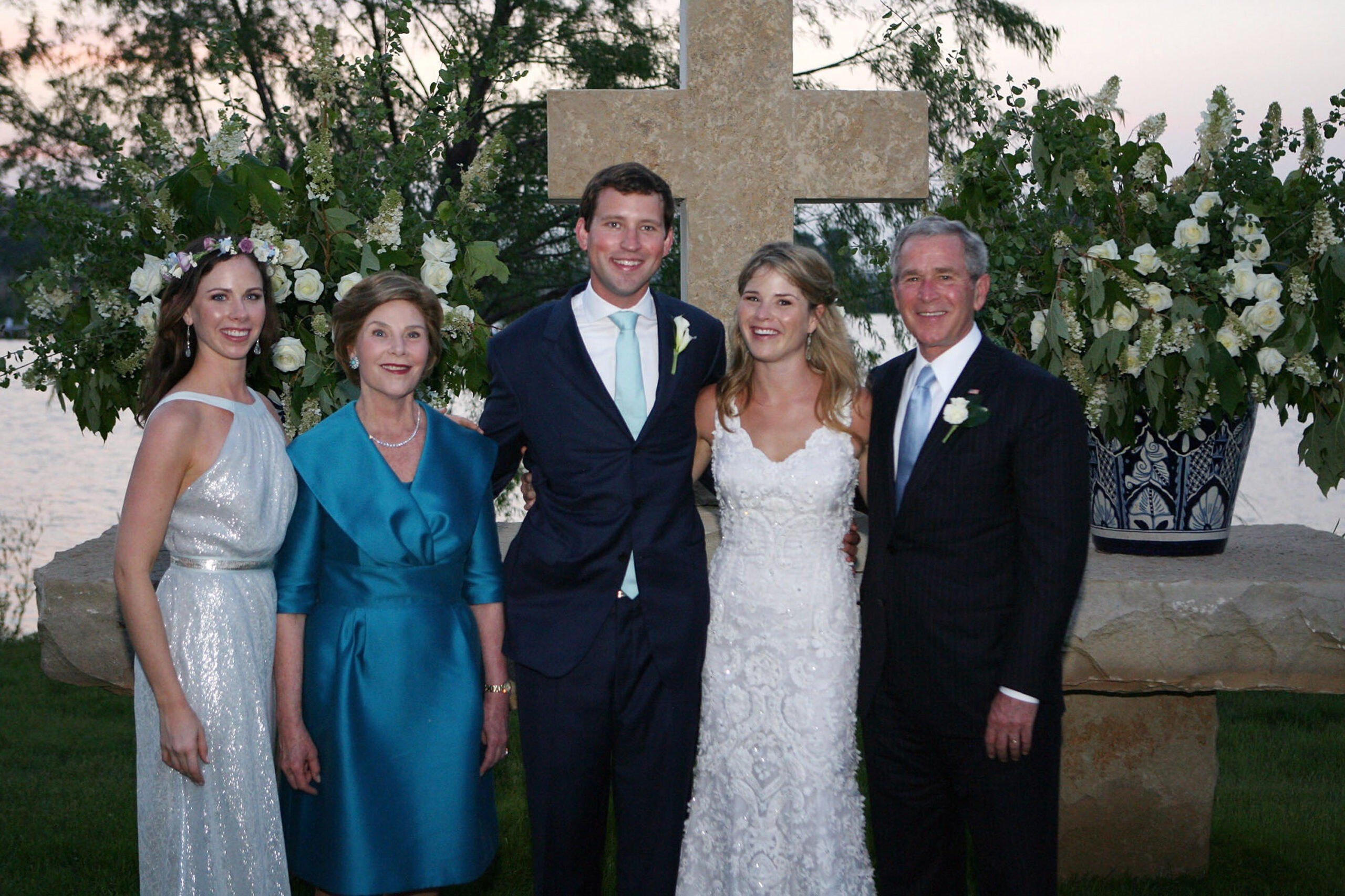 CRAWFORD, TX - MAY 10: In this handout image provided by the White House, President George W. Bush (R) and Mrs. Laura Bush (2L) and Barbara Bush (L) stand with the new Mr. and Mrs. Henry Hager following the young couple's wedding ceremony at Prairie Chapel Ranch May 10, 2008 near Crawford, Texas. (Photo by Shealah Craighead/The White House via FilmMagic)