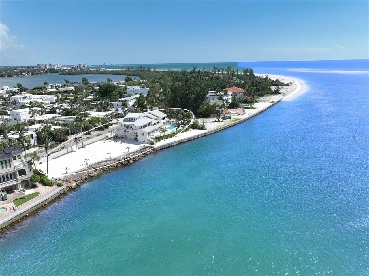 The property boasts 240 feet of waterfront footage on the Gulf of Mexico.