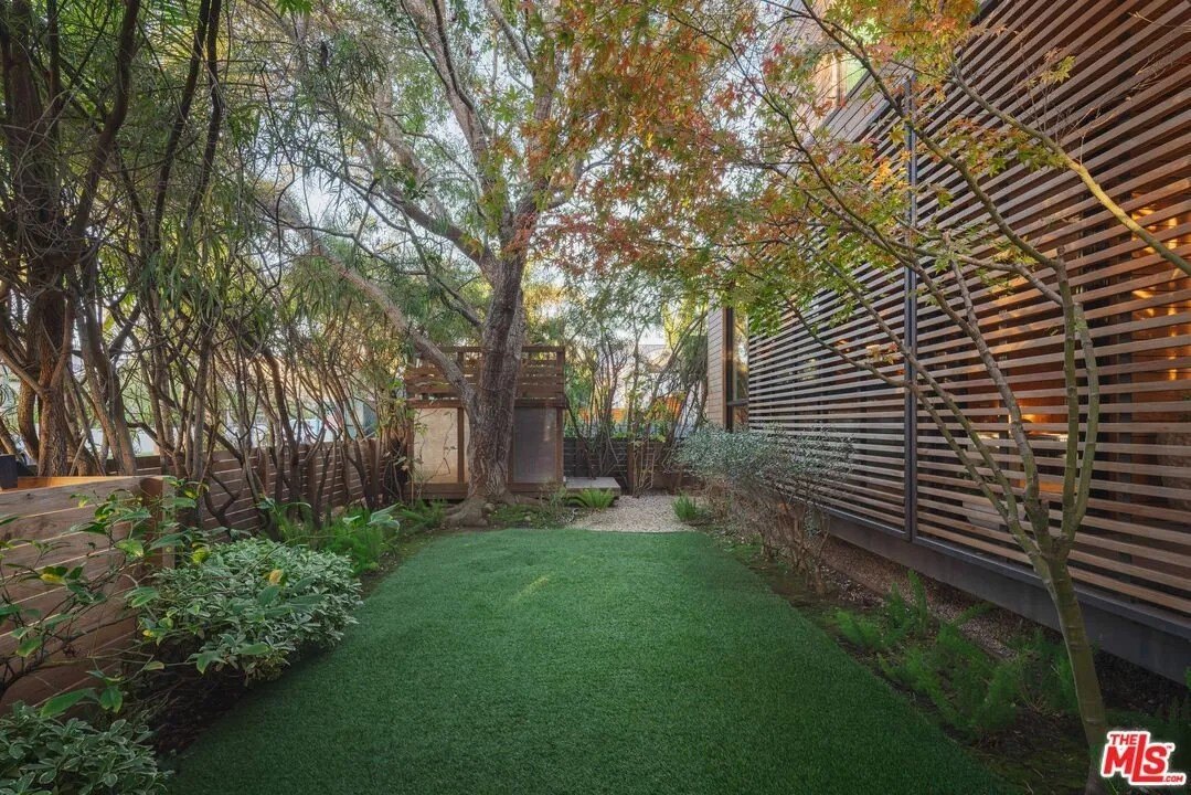 Plenty of green space allows this home to feel as if its far away from the city, although it's only a few blocks from the restaurants and boutiques of trendy Abbott Kinney, and just minutes from the beach.