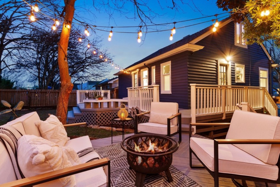 Backyard hangout with couch and fireplace