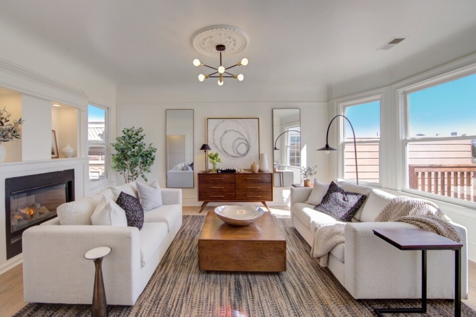 Living room with two sofas and natural lighting