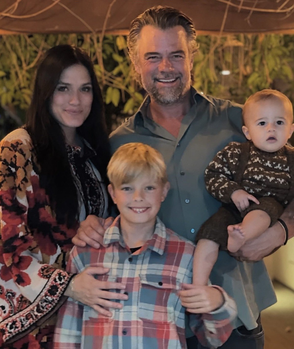 Actor Josh Duhamel pictured with wife Audra Mari, their 1-year-old son Shepherd, and his 11-year-old son Axl Jack, who he shares with his first wife, Fergie.