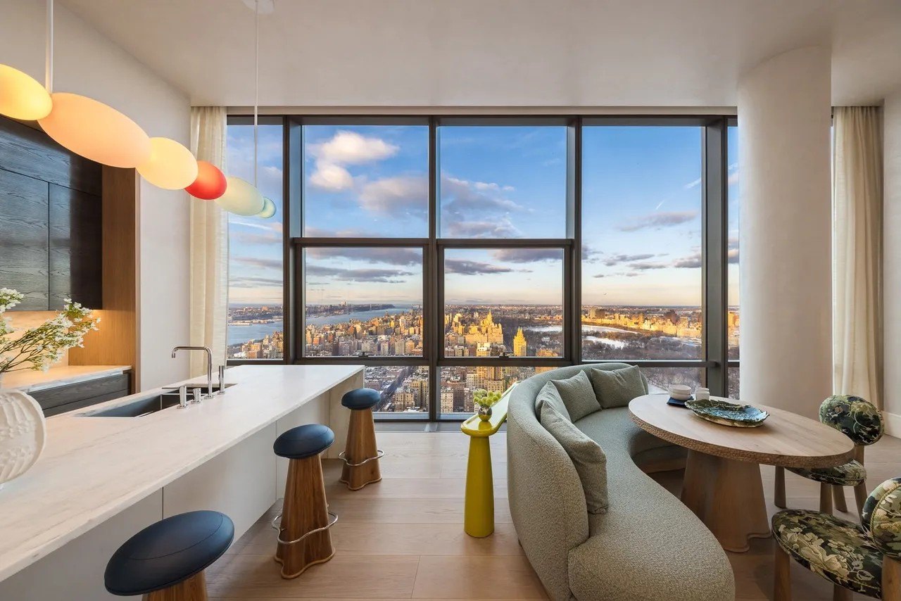 The eat-in kitchen features high-end appliances.