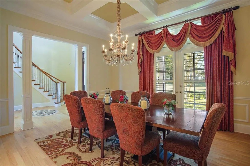 Inside the $1.2 Million Florida Home Za'Darius Smith Will Retreat To As He Announces Shock Retirement From Philadelphia Eagles Dining table with chandelier in Za'Darius Smith's home in Florida