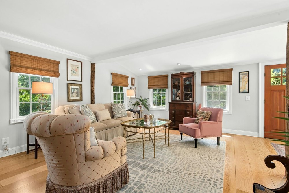 Living room of home part of the Pollinator Pathway Project in Wilton, CT, on sale for $865,000