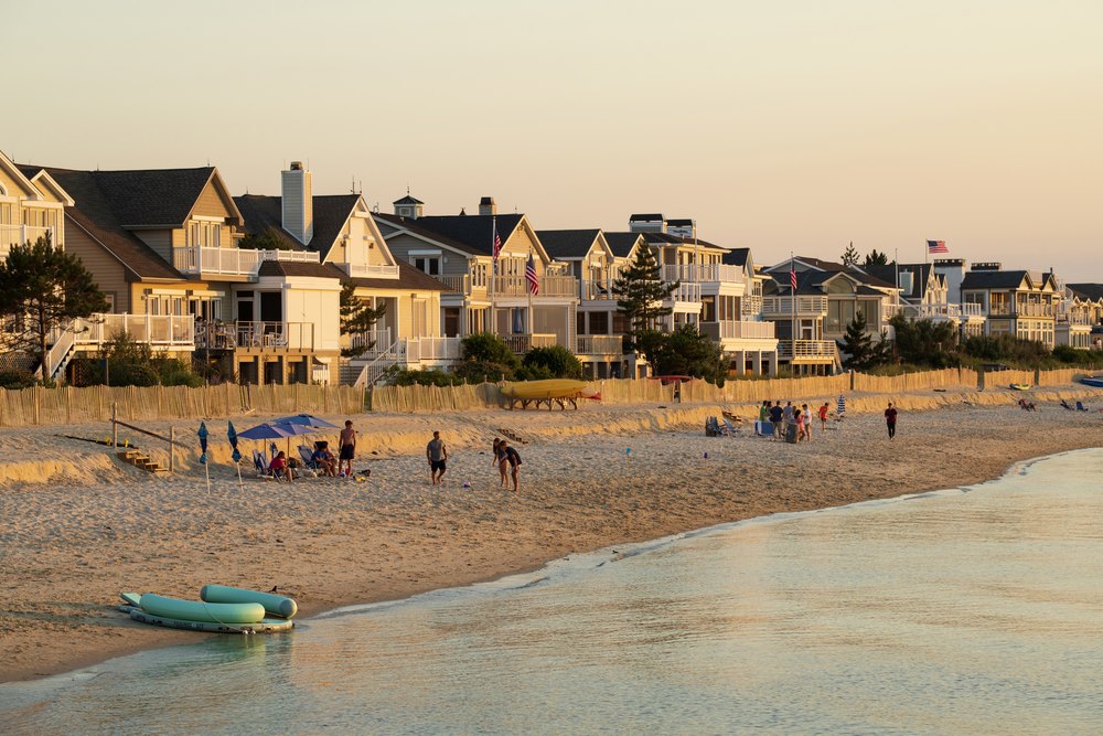 People enjoying beach activities at Sunset, Cape Henlopen State Park, Delaware, USA