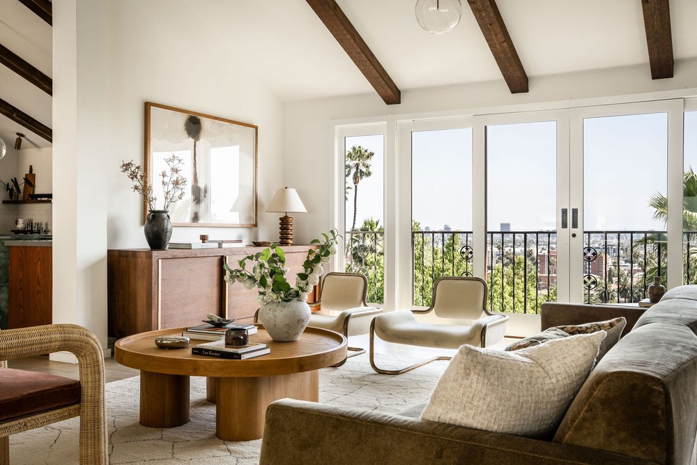 Living space with doors to outside in actress Malin Akerman home in Los Feliz California