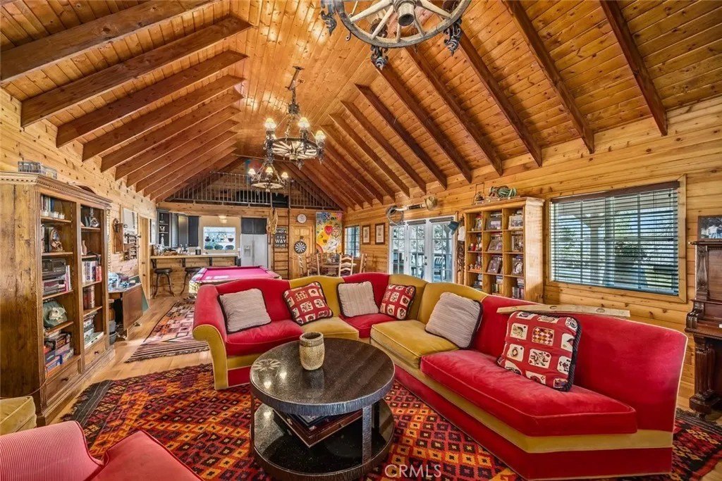 Large entertainment spaces include this nearly 1,000 square foot game room, with a honeymoon suite attached.