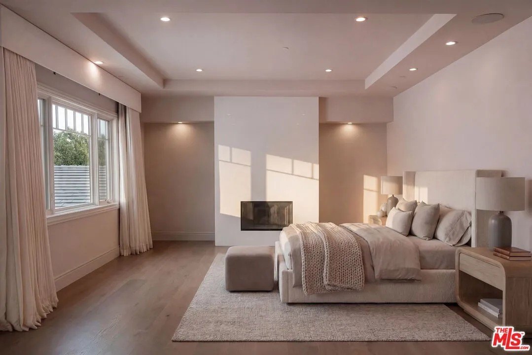 A bedroom with a fireplace in a home in Hidden Hills California belonging to Kylie Jenner