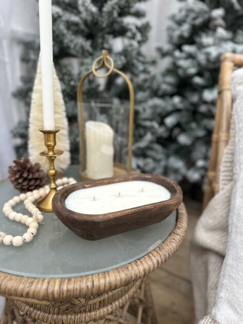 Candle on table with other decor items