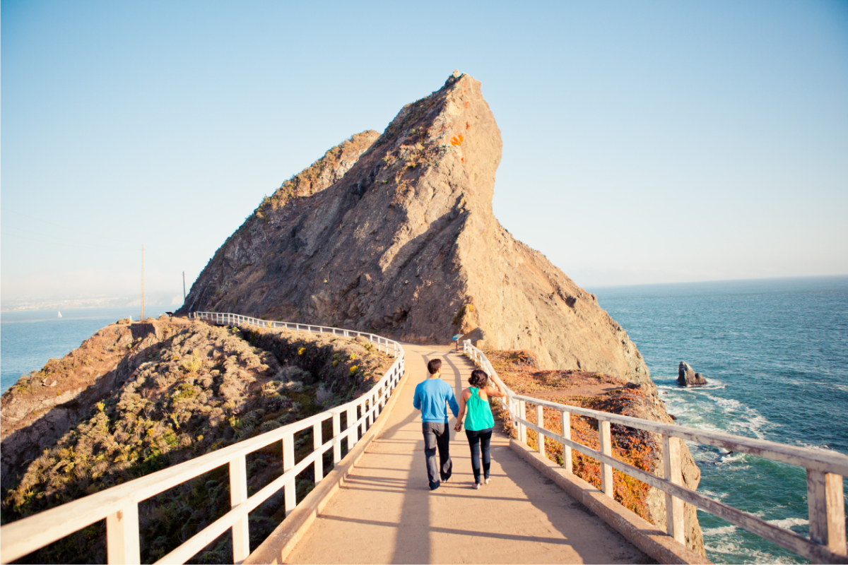 A trail with a big rock