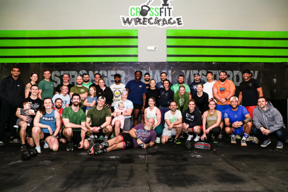 Group photo of adults in a gym