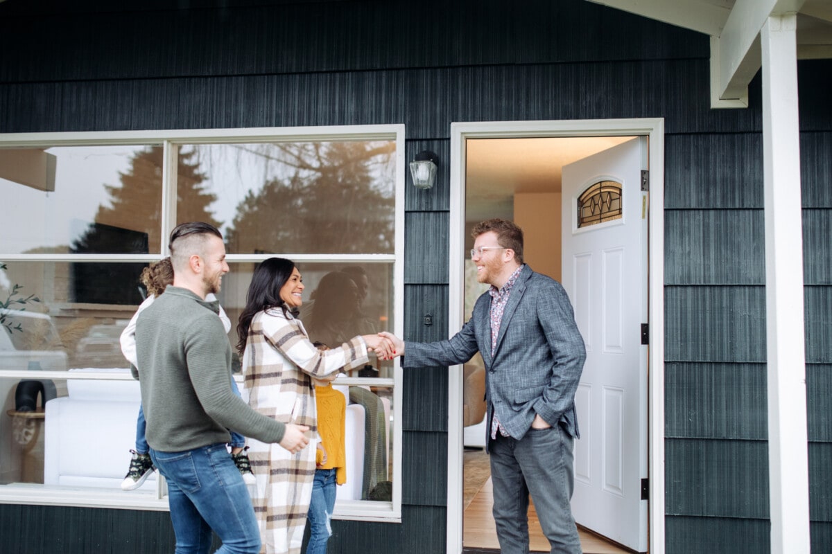 Real Estate Agent Meeting Prospective Buyers in Georgia